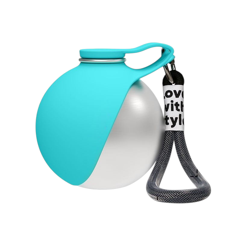 The Tailored Tail collapsible Tiffany blue and stainless steel pet water bottle with a carrying hook